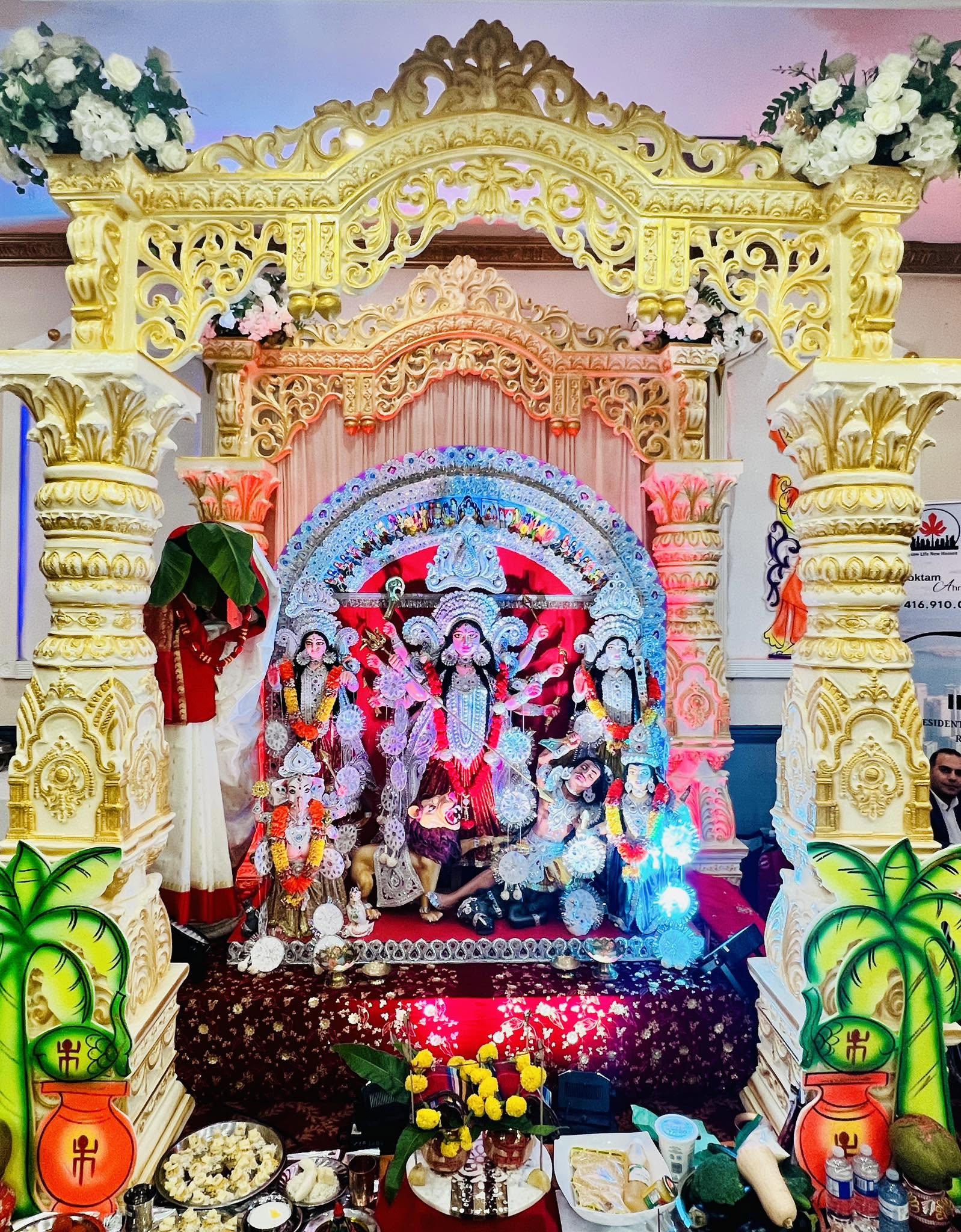 Ma Durga idol on a decorated pandal at TBCS Durga Puja